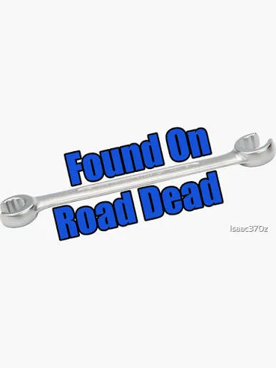 Wrench with Found On Road Dead written on it